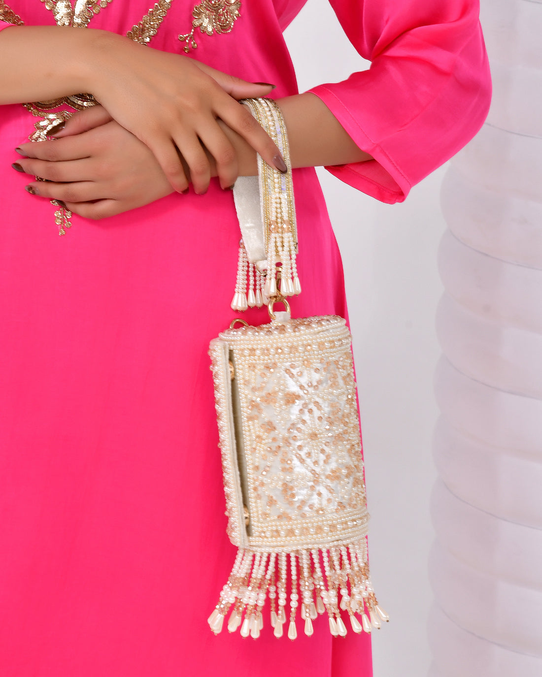 Dual use round potli bag